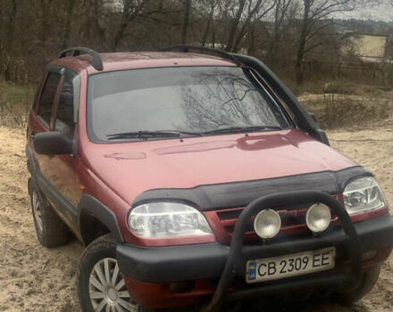 Красный ВАЗ 2123 Niva, объемом двигателя 1.69 л и пробегом 217 тыс. км за 3900 $, фото 3 на Automoto.ua