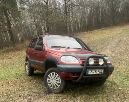 Красный ВАЗ 2123 Niva, объемом двигателя 1.69 л и пробегом 217 тыс. км за 3900 $, фото 1 на Automoto.ua