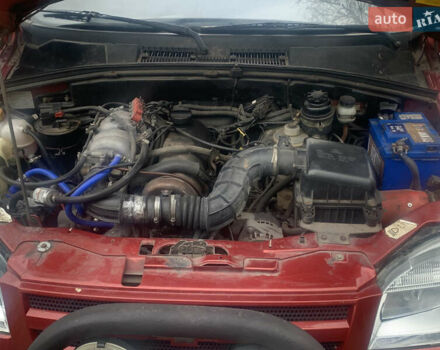 Красный ВАЗ 2123 Niva, объемом двигателя 1.69 л и пробегом 217 тыс. км за 3900 $, фото 4 на Automoto.ua