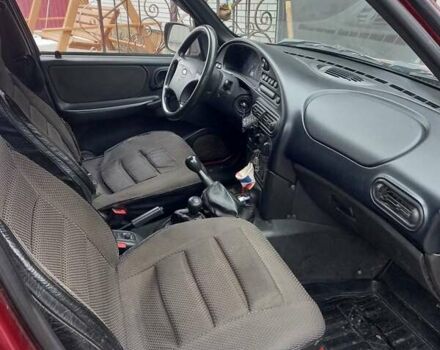 Красный ВАЗ 2123 Niva, объемом двигателя 1.7 л и пробегом 140 тыс. км за 4500 $, фото 5 на Automoto.ua