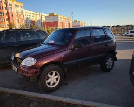 Красный ВАЗ 2123 Niva, объемом двигателя 1.69 л и пробегом 234 тыс. км за 2268 $, фото 1 на Automoto.ua