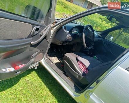 Серый ВАЗ 2123 Niva, объемом двигателя 1.69 л и пробегом 325 тыс. км за 3250 $, фото 6 на Automoto.ua