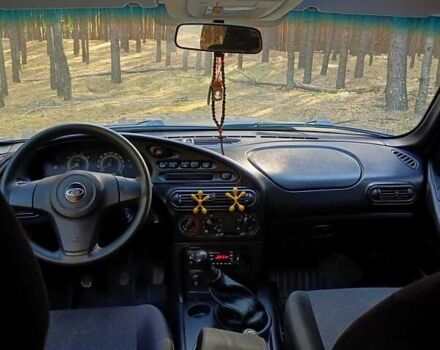 Сірий ВАЗ 2123 Niva, об'ємом двигуна 1.69 л та пробігом 60 тис. км за 11500 $, фото 29 на Automoto.ua