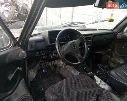 Черный ВАЗ 2131 Нива, объемом двигателя 1.69 л и пробегом 159 тыс. км за 1650 $, фото 3 на Automoto.ua