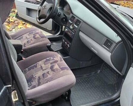 Черный ВАЗ 2170 Priora, объемом двигателя 1.6 л и пробегом 209 тыс. км за 2200 $, фото 6 на Automoto.ua