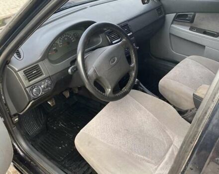 Чорний ВАЗ 2170 Priora, об'ємом двигуна 1.6 л та пробігом 450 тис. км за 1999 $, фото 4 на Automoto.ua