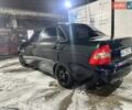 Черный ВАЗ 2170 Priora, объемом двигателя 1.6 л и пробегом 312 тыс. км за 2100 $, фото 1 на Automoto.ua