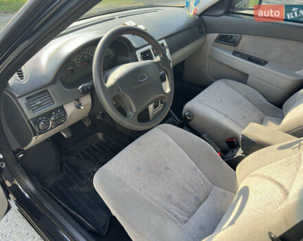 Черный ВАЗ 2170 Priora, объемом двигателя 1.6 л и пробегом 164 тыс. км за 2699 $, фото 6 на Automoto.ua