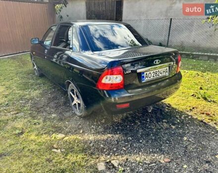 Черный ВАЗ 2170 Priora, объемом двигателя 1.6 л и пробегом 165 тыс. км за 2000 $, фото 1 на Automoto.ua