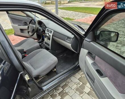Черный ВАЗ 2170 Priora, объемом двигателя 1.6 л и пробегом 135 тыс. км за 3000 $, фото 19 на Automoto.ua