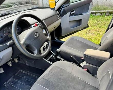 Черный ВАЗ 2170 Priora, объемом двигателя 1.6 л и пробегом 165 тыс. км за 2000 $, фото 5 на Automoto.ua
