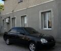 Черный ВАЗ 2170 Priora, объемом двигателя 1.6 л и пробегом 250 тыс. км за 2557 $, фото 1 на Automoto.ua