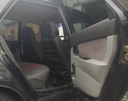 Черный ВАЗ 2170 Priora, объемом двигателя 1.6 л и пробегом 161 тыс. км за 2000 $, фото 4 на Automoto.ua