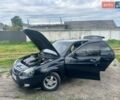 Черный ВАЗ 2170 Priora, объемом двигателя 1.6 л и пробегом 150 тыс. км за 1980 $, фото 1 на Automoto.ua