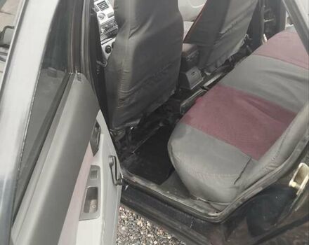 Черный ВАЗ 2170 Priora, объемом двигателя 1.6 л и пробегом 161 тыс. км за 2000 $, фото 5 на Automoto.ua