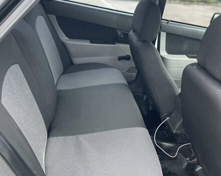 Черный ВАЗ 2170 Priora, объемом двигателя 1.6 л и пробегом 140 тыс. км за 3000 $, фото 2 на Automoto.ua