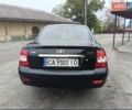 Черный ВАЗ 2170 Priora, объемом двигателя 1.6 л и пробегом 142 тыс. км за 2499 $, фото 1 на Automoto.ua