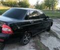 Черный ВАЗ 2170 Priora, объемом двигателя 1.6 л и пробегом 180 тыс. км за 2350 $, фото 1 на Automoto.ua