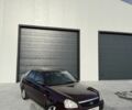 Красный ВАЗ 2170 Priora, объемом двигателя 1.6 л и пробегом 150 тыс. км за 2350 $, фото 1 на Automoto.ua