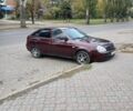 Красный ВАЗ 2170 Priora, объемом двигателя 1.6 л и пробегом 158 тыс. км за 3300 $, фото 4 на Automoto.ua