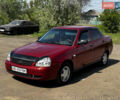 Красный ВАЗ 2170 Priora, объемом двигателя 1.6 л и пробегом 235 тыс. км за 2000 $, фото 1 на Automoto.ua