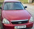 Красный ВАЗ 2170 Priora, объемом двигателя 1.6 л и пробегом 245 тыс. км за 1150 $, фото 1 на Automoto.ua