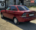 Красный ВАЗ 2170 Priora, объемом двигателя 1.6 л и пробегом 235 тыс. км за 2000 $, фото 1 на Automoto.ua