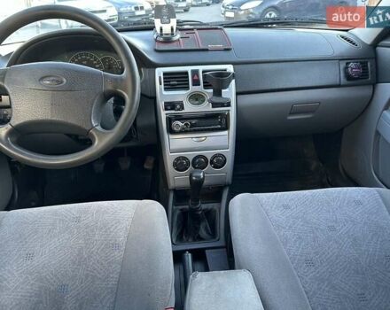 Червоний ВАЗ 2170 Priora, об'ємом двигуна 1.6 л та пробігом 249 тис. км за 1899 $, фото 9 на Automoto.ua
