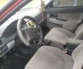 Красный ВАЗ 2170 Priora, объемом двигателя 1.6 л и пробегом 130 тыс. км за 2000 $, фото 4 на Automoto.ua