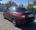 Красный ВАЗ 2170 Priora, объемом двигателя 1.6 л и пробегом 185 тыс. км за 2000 $, фото 1 на Automoto.ua