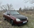 Красный ВАЗ 2170 Priora, объемом двигателя 1.6 л и пробегом 146 тыс. км за 2000 $, фото 1 на Automoto.ua