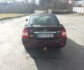 Красный ВАЗ 2170 Priora, объемом двигателя 1.6 л и пробегом 207 тыс. км за 2600 $, фото 1 на Automoto.ua
