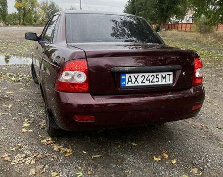 Красный ВАЗ 2170 Priora, объемом двигателя 1.6 л и пробегом 185 тыс. км за 2050 $, фото 1 на Automoto.ua