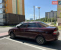 Красный ВАЗ 2170 Priora, объемом двигателя 1.6 л и пробегом 230 тыс. км за 1900 $, фото 1 на Automoto.ua