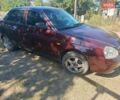 Красный ВАЗ 2170 Priora, объемом двигателя 1.6 л и пробегом 231 тыс. км за 2400 $, фото 1 на Automoto.ua