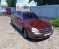 Красный ВАЗ 2170 Priora, объемом двигателя 1.6 л и пробегом 175 тыс. км за 2750 $, фото 1 на Automoto.ua