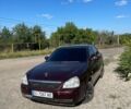 Червоний ВАЗ 2170 Priora, об'ємом двигуна 1.6 л та пробігом 206 тис. км за 2233 $, фото 1 на Automoto.ua