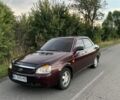Красный ВАЗ 2170 Priora, объемом двигателя 1.6 л и пробегом 221 тыс. км за 2599 $, фото 1 на Automoto.ua