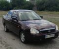 Красный ВАЗ 2170 Priora, объемом двигателя 1.6 л и пробегом 199 тыс. км за 1999 $, фото 1 на Automoto.ua