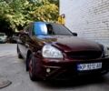 Красный ВАЗ 2170 Priora, объемом двигателя 1.6 л и пробегом 156 тыс. км за 2590 $, фото 1 на Automoto.ua