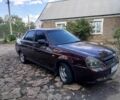 Красный ВАЗ 2170 Priora, объемом двигателя 1.6 л и пробегом 200 тыс. км за 1900 $, фото 1 на Automoto.ua
