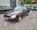 Красный ВАЗ 2170 Priora, объемом двигателя 1.6 л и пробегом 166 тыс. км за 2350 $, фото 1 на Automoto.ua