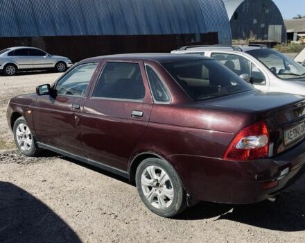 Красный ВАЗ 2170 Priora, объемом двигателя 1.6 л и пробегом 160 тыс. км за 1400 $, фото 1 на Automoto.ua