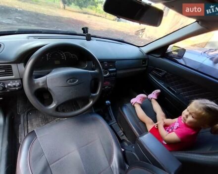 Красный ВАЗ 2170 Priora, объемом двигателя 1.6 л и пробегом 320 тыс. км за 2500 $, фото 2 на Automoto.ua