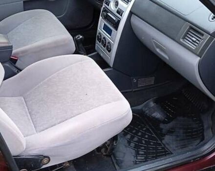 Красный ВАЗ 2170 Priora, объемом двигателя 1.6 л и пробегом 238 тыс. км за 1799 $, фото 14 на Automoto.ua