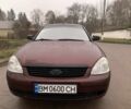 Красный ВАЗ 2170 Priora, объемом двигателя 1.6 л и пробегом 135 тыс. км за 3000 $, фото 1 на Automoto.ua