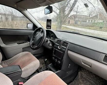 Красный ВАЗ 2170 Priora, объемом двигателя 1.6 л и пробегом 146 тыс. км за 2000 $, фото 5 на Automoto.ua