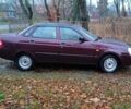 Красный ВАЗ 2170 Priora, объемом двигателя 1.6 л и пробегом 238 тыс. км за 1799 $, фото 1 на Automoto.ua