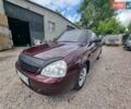 Красный ВАЗ 2170 Priora, объемом двигателя 1.6 л и пробегом 262 тыс. км за 2150 $, фото 1 на Automoto.ua