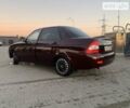 Красный ВАЗ 2170 Priora, объемом двигателя 1.6 л и пробегом 260 тыс. км за 3200 $, фото 1 на Automoto.ua